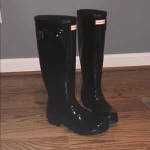 Tall glossy hunter boots